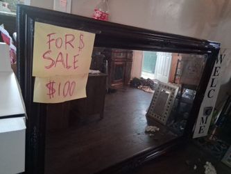 Large mirror with beveled glass, solid wood.