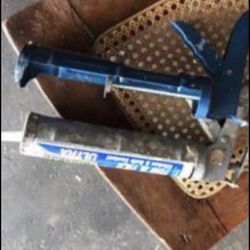 Two. Used caulk guns.