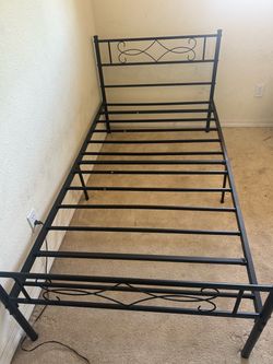 Twin bed with frame.