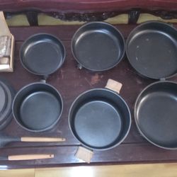 Open box Carote 11 Piece Pan & pots cookware set with lids, spatula, & soup ladle. 