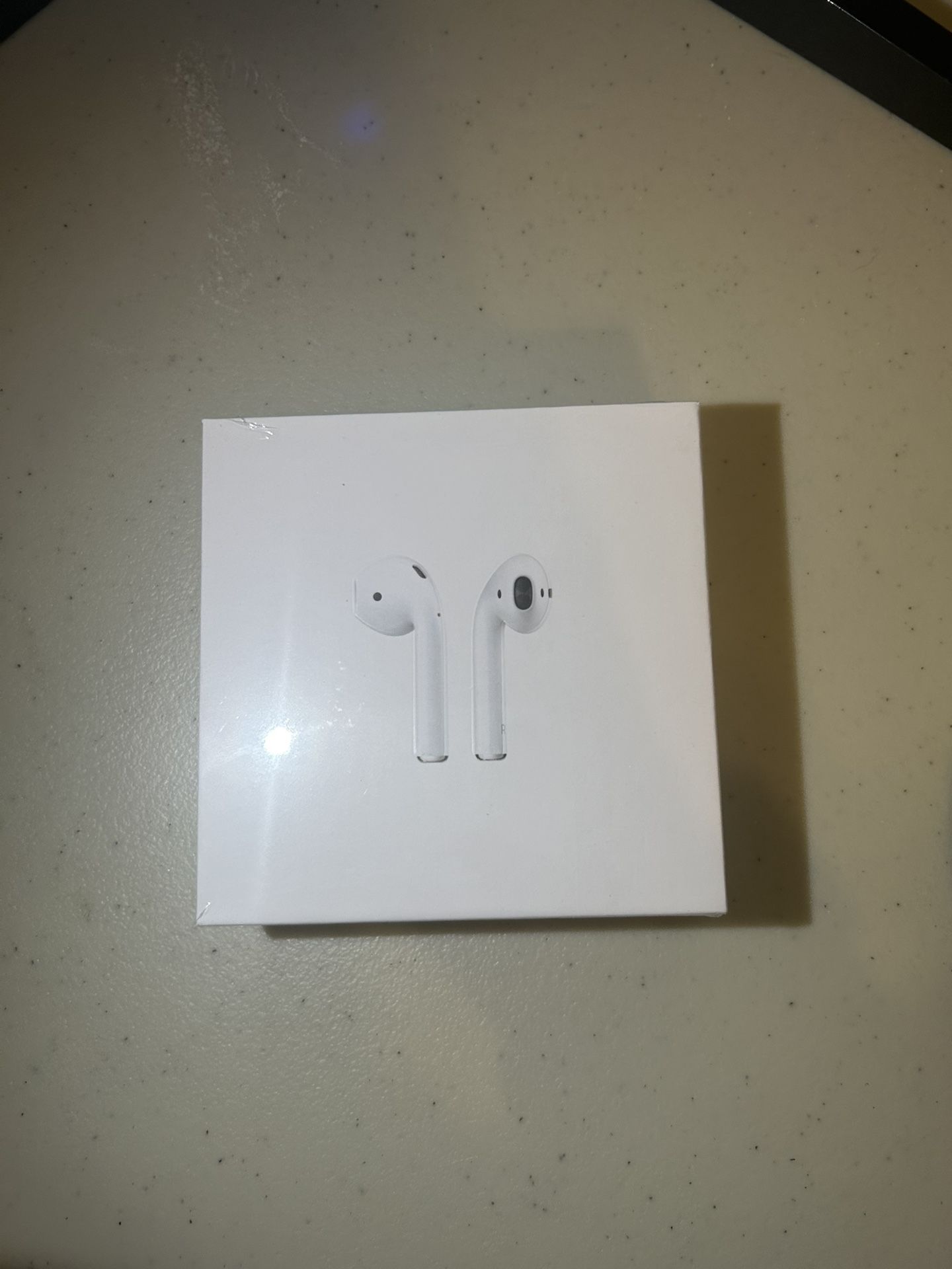 Apple AirPods Generation 2 White Charging Case.