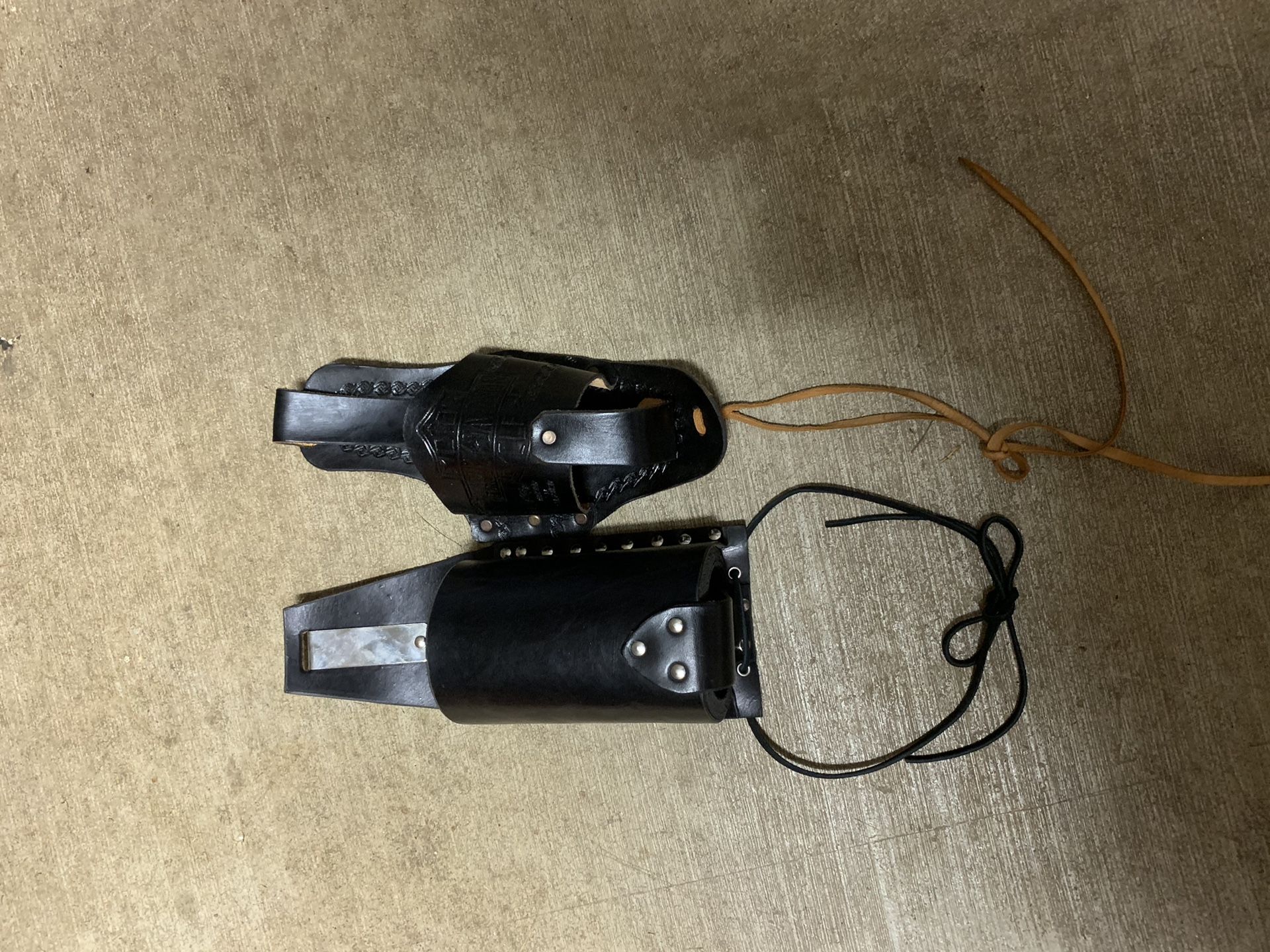 Beer belt holders - one is a Harley Davidson