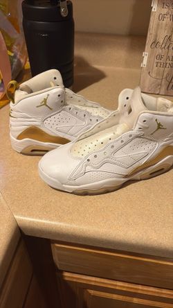 Gold and white Air
