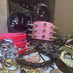 100 pcs of GOTHIC PUNK Random Jewelry Bulk - BRAND NEW - Faux Leather Bracelets , Necklaces , Rings, Keychains , earringsJewelry Box Lot , Random , Pu