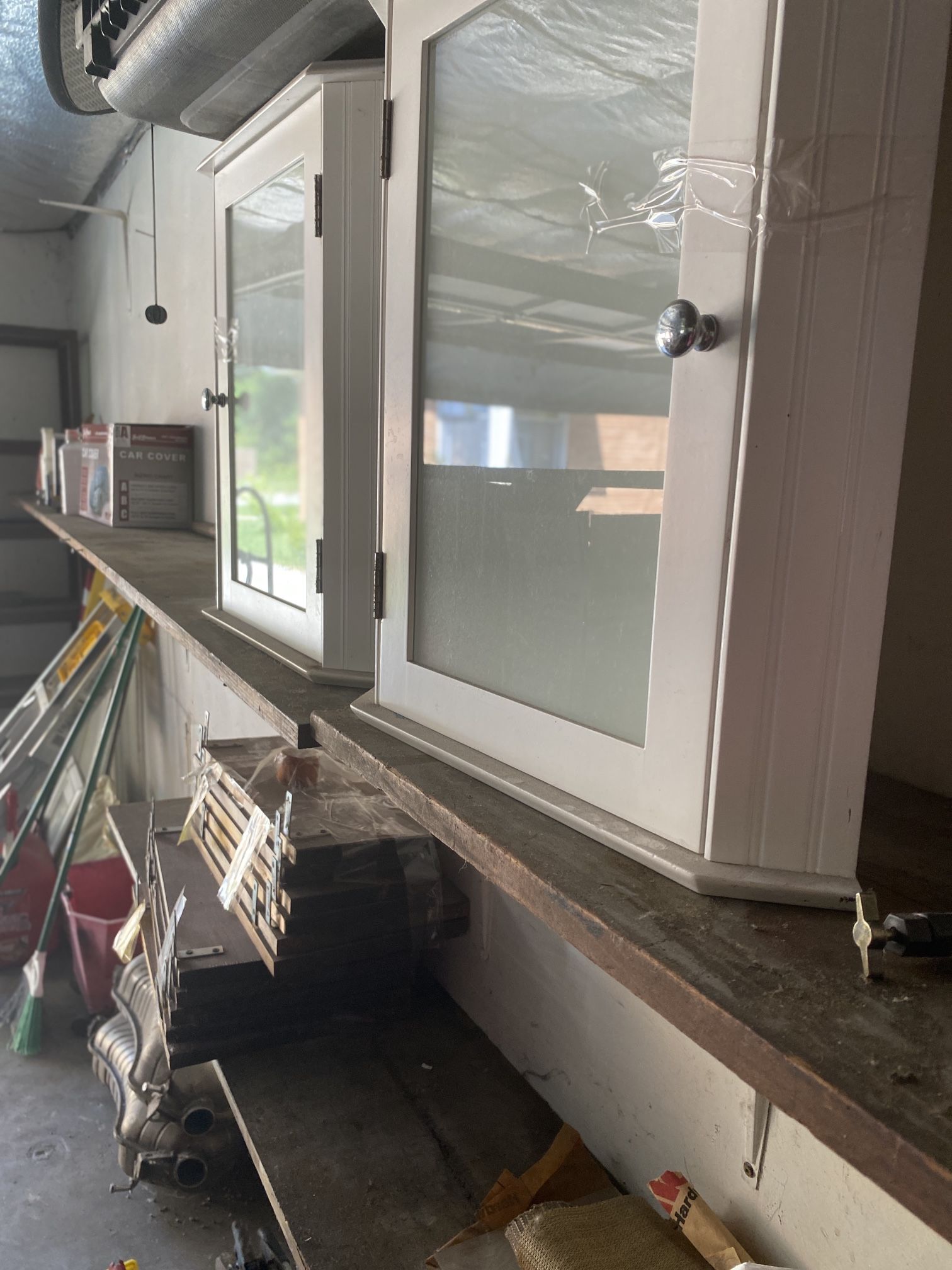 2 white bathroom wall cabinet with a glass-fronted door