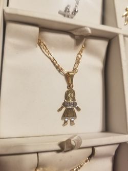 Cadena con dige de hija de oro laminado