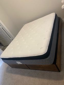 Queen size bed with free mattress