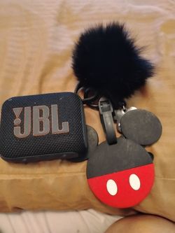 JBL with a ball and and mickey mouse key ring