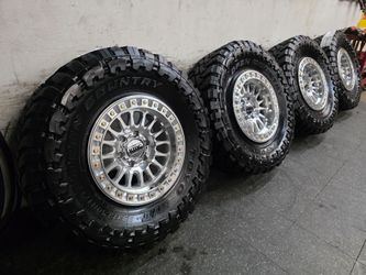17" KMC w- 35" Toyo MT 17x9 -10 offset 35's