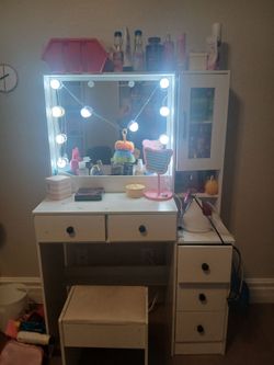 White vanity with stool