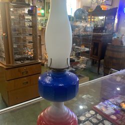 7x22 Red White and Blue early American oil lamp. 35.00. Johanna at Antiques and More. Located at 316b Main Street Buda. Antiques vintage retro furnitu