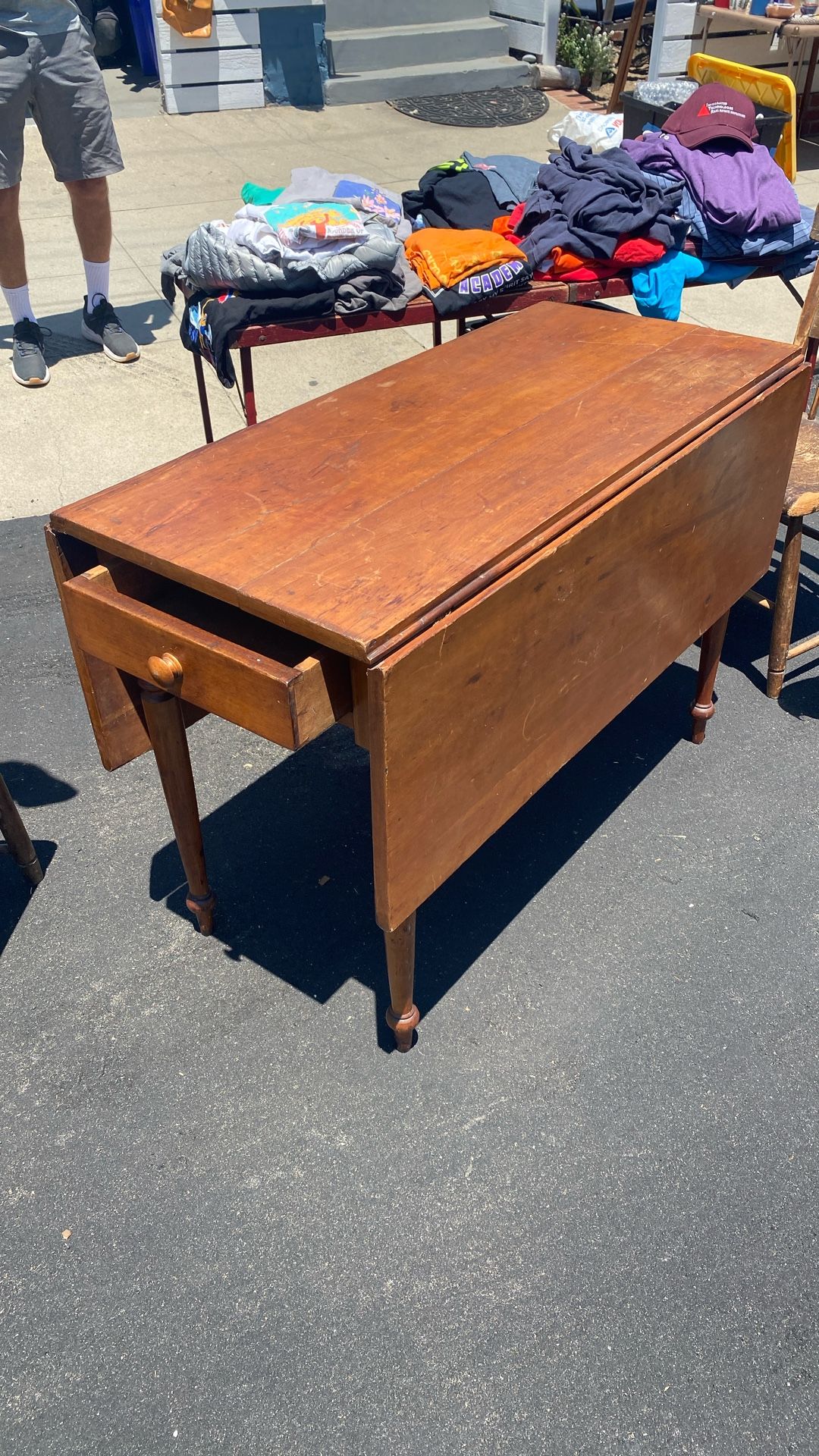 Antique drop leaf table with a drawer