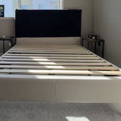 Upholstered beige full size bed frame