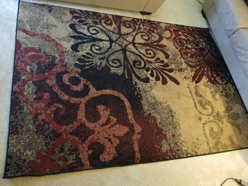 Multicolored floral fleece area rug