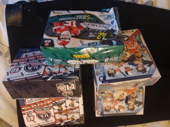 4 baseball card boxs and 1 football card set