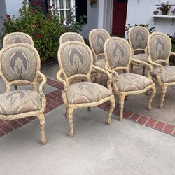 Dining Chairs table was sold hand carved from a mansion in San Marino I can deliver if needed