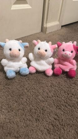 Three plushie cows