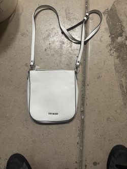 Steve Madden white Handbag.  With flat studs Used once. 