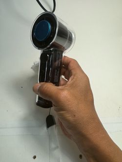 Ac hand portable fan