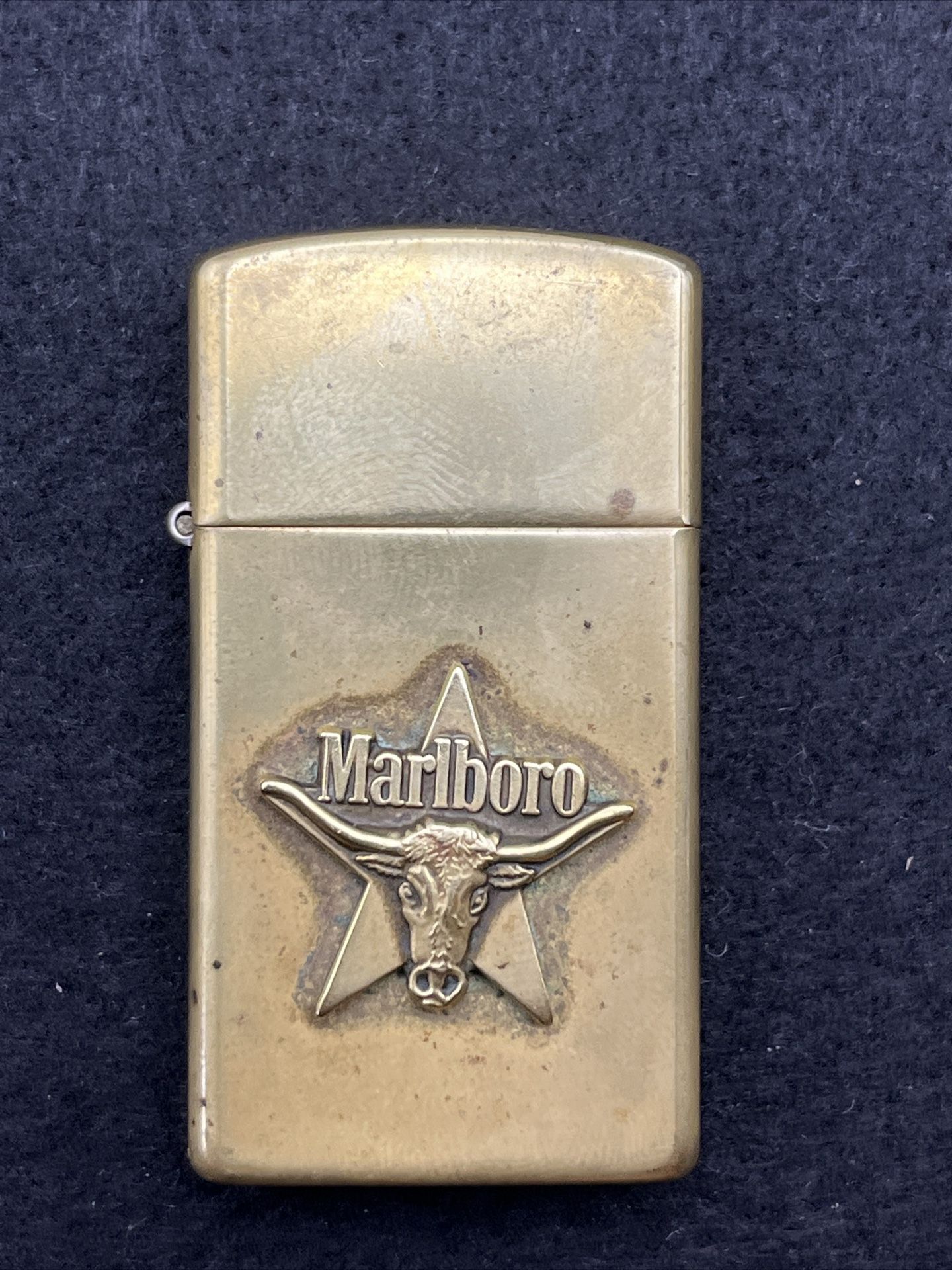 Vintage Zippo Slim Marlboro Long Horn on Star Brass Lighter