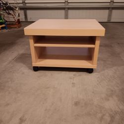 Pair of end tables on wheels