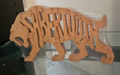 NEW SEALED " SABERTOOTH " TIGGER BROWN/TAN  WOODEN PUZZLE PIECES