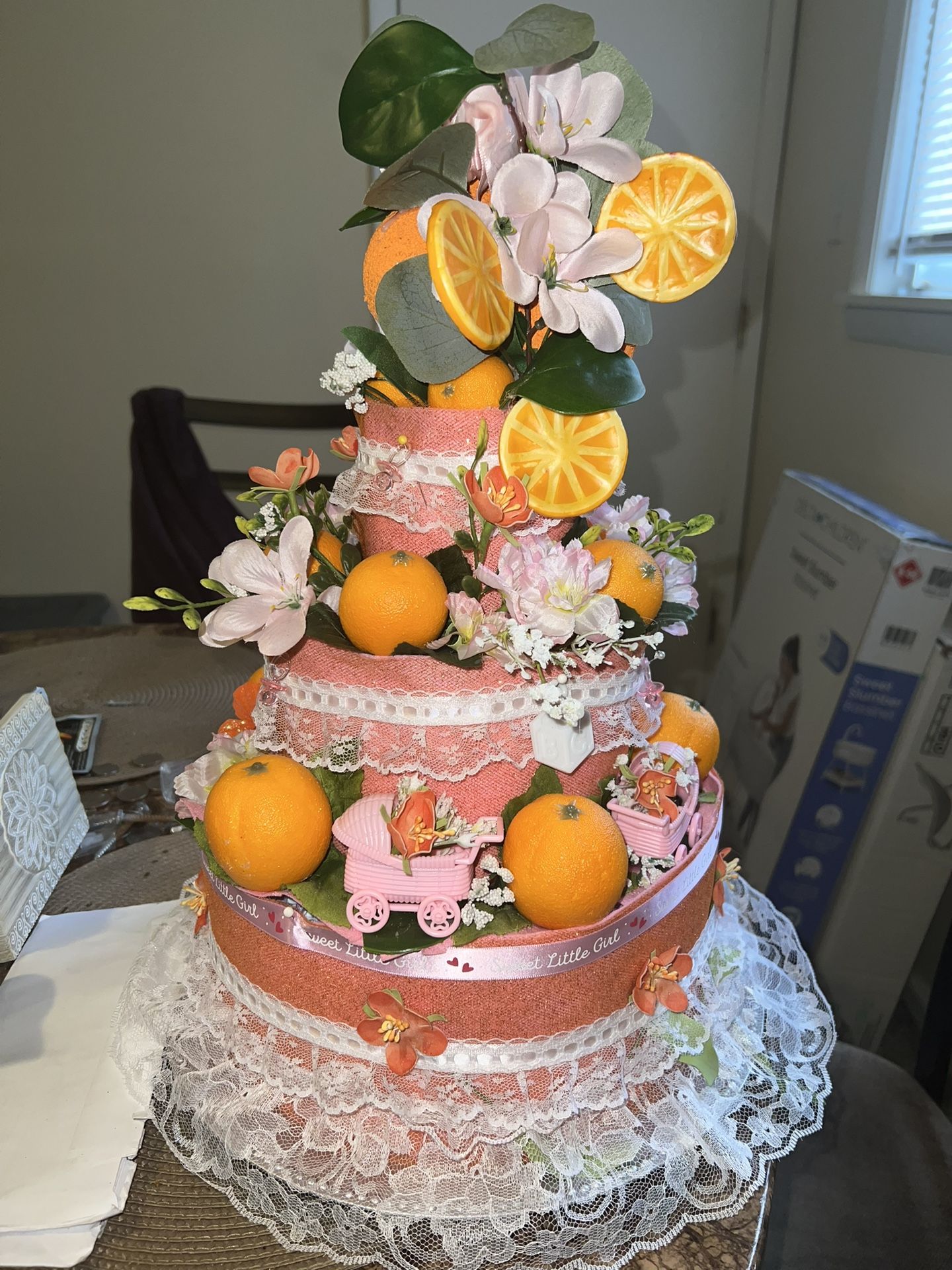 little cutie theme baby shower diaper cake