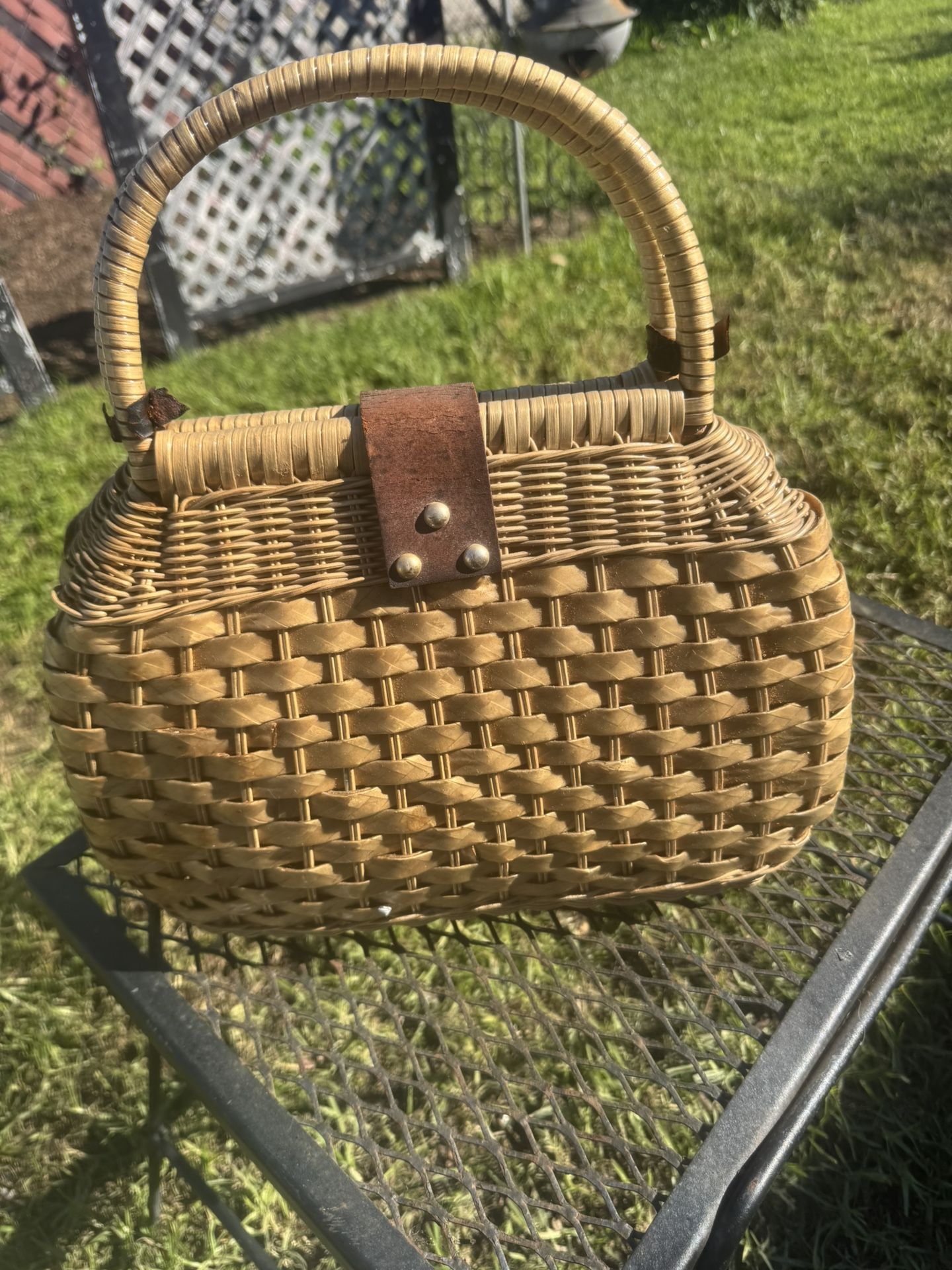 Charming vintage wicker basket purse, likely from the 1950s or 1960s