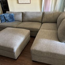 Brand new Costco Sectional with ottoman