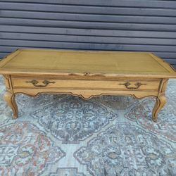 Vintage Mid Century Country French Solid Wood Coffee Table with Original Fruitwood Finish and One Large Drawer.