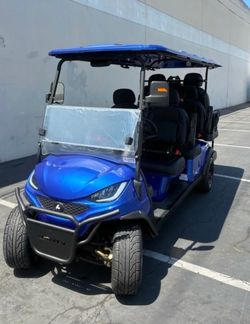 2026 ACTIV EV 6-PASSENGER NON-LIFTED STREET LEGAL LSV GOLF CART IN METALLIC HYDRO BLUE W/BLACK SEATS (HEADRESTS) W/BLUE PIPING & STITCHING