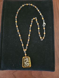 Glass bead with dragon pendant necklace