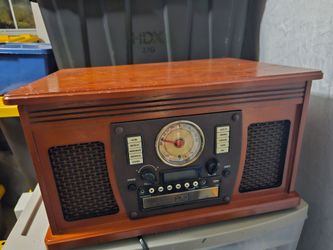 Victorola mahogany 8 in 1 bluetooth record player. Has many options. Make reasonable offer