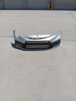 23 to 25 toyota corolla se xse front bumpet and grille ( oem)