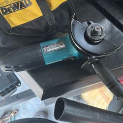 Makita Grinder With Accessories 