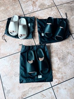 Yeezy’s Slides  run small  X 2 Onyx Size 12  Cream size 11