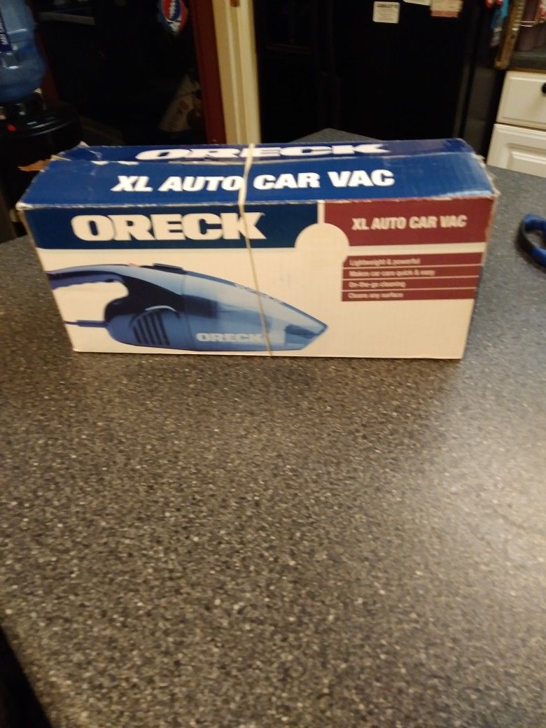 ORECK. XL AUTO CAR VAC VERY STRONG. NEW OPEN BOX.