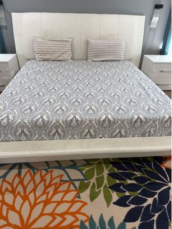 King size bed with side table and dresser with chest
