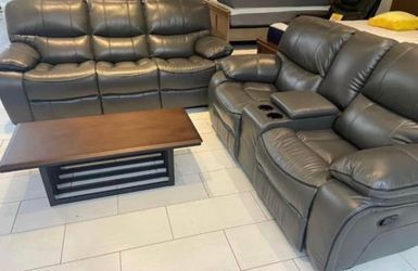 Fall clearance sale. Madrid, gray leather reclining sofa and loveseat set only $1099. Easy finance option and full service delivery available.