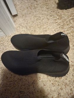 Brand new Black Skechers