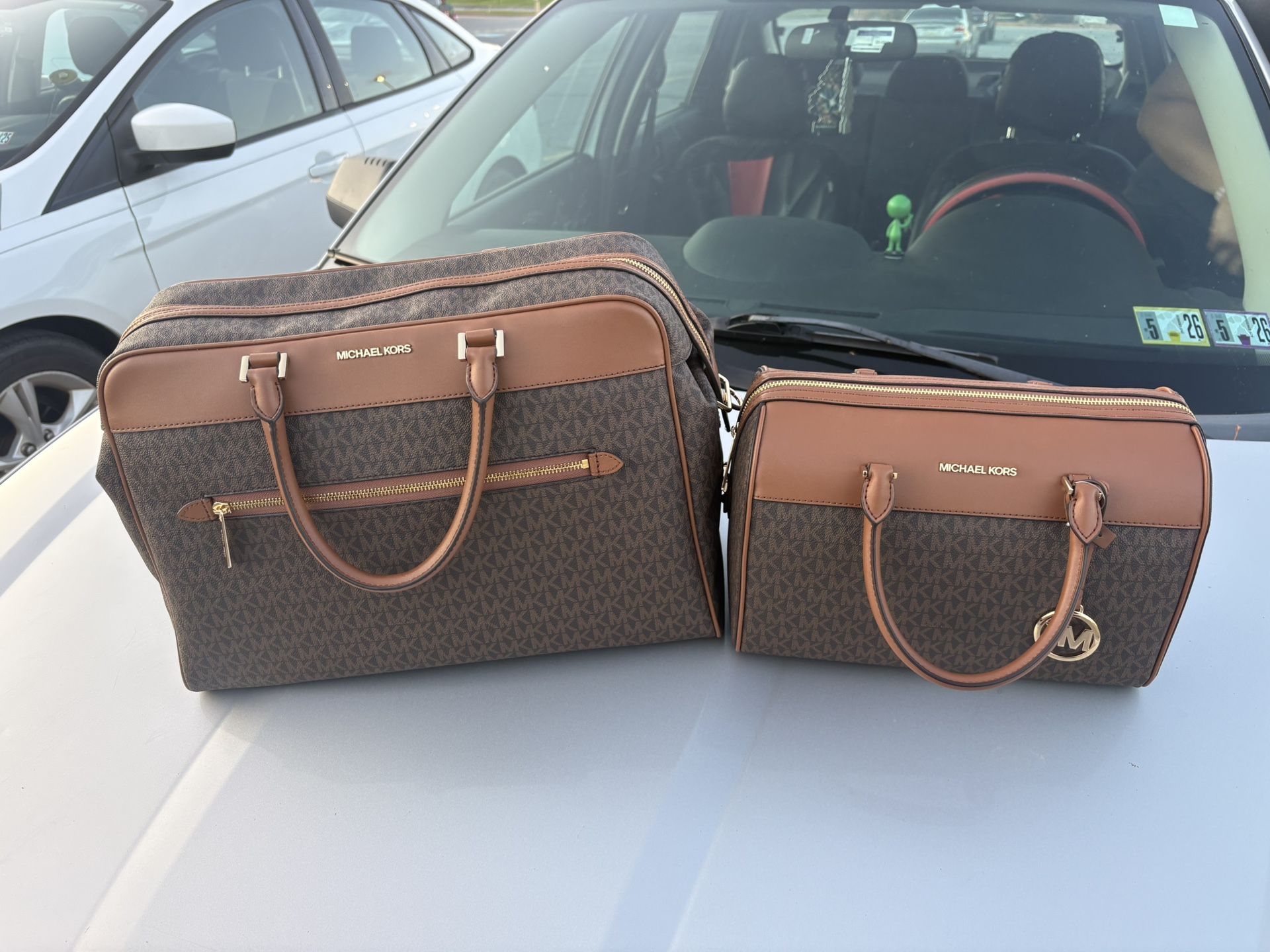 Set of Michael Kors Luggage and Carry bag