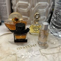 4 Miniature Perfumes.  Designer & Avon
