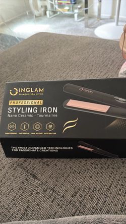 New in box flat iron