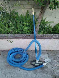 Pool cleaning brush with hose
