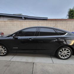 Trade or sale  2017 ford fusion hybrid clean Title 107k miles  or  a 2007 jeep wrangler unlimited X 4x4 Sport v6 clean Title 150k miles one owner  per