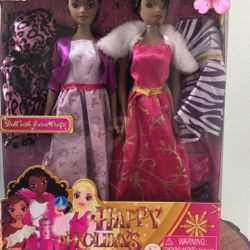 2 Dolls With Extra Outfits