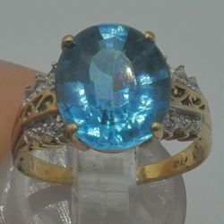 10KT YELLOW GOLD FASHION RING WITH DIAMONDS AND BLUE STONE 3.9GR SIZE 6.75. 848960-1.
