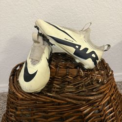 Nike Jr. Zoom Mercurial Vapor 15 Academy soccer cleats in yellow/cream with black. Youth (US kids) 4