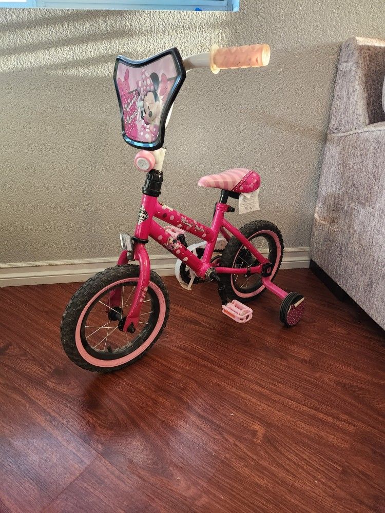 Disney 12"Minnie Mouse Bike with Training-Wheels. Ages 2+(Huffy).Only used a few times. $35