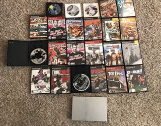 Silver Ps2 with 23 games (no controller/adapter)